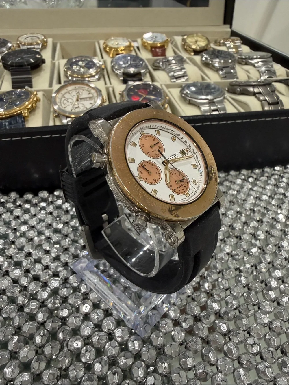 Seiko White Dial Watch with Gold-Tone Accents and Black Strap